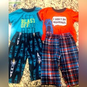 Bundle of 2 pj sets from child of mine 12 months